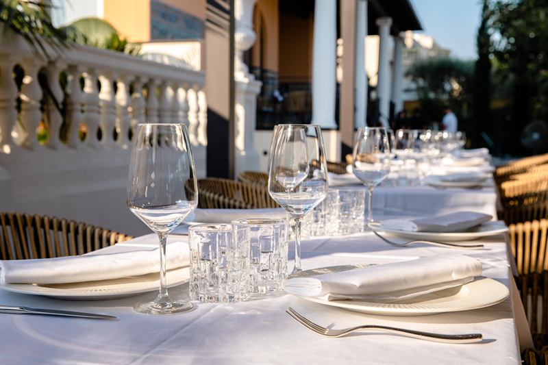 Glassware and linen on a terrace table